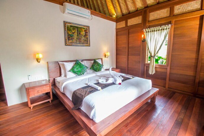 Imagen de la habitación del Hotel Villa Waturenggong Ubud. Foto 22