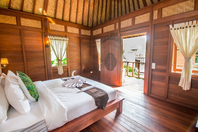 Imagen de la habitación del Hotel Villa Waturenggong Ubud. Foto 27