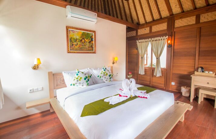 Imagen de la habitación del Hotel Villa Waturenggong Ubud. Foto 30