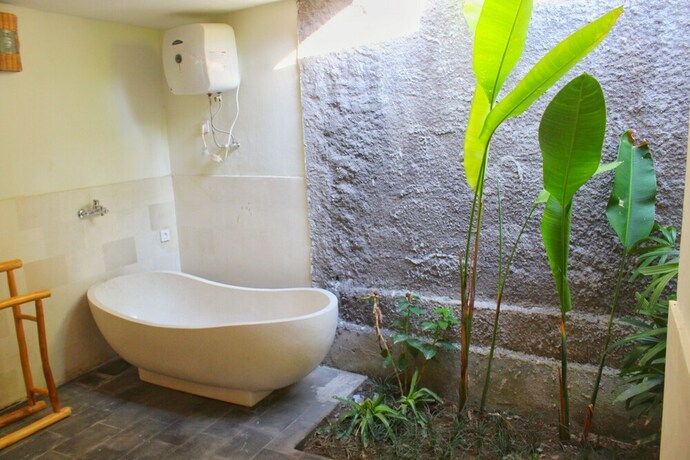 Imagen de la habitación del Hotel Villa Waturenggong Ubud. Foto 33