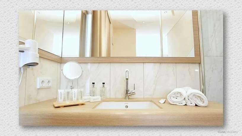 Imagen de la habitación del Hotel Villa Will. Foto 9