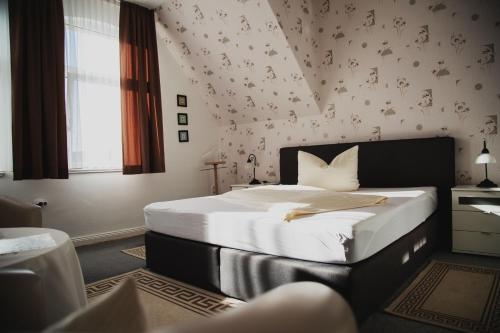 Imagen de la habitación del Hotel Villa Zur Sch&ouml;nen Aussicht. Foto 10