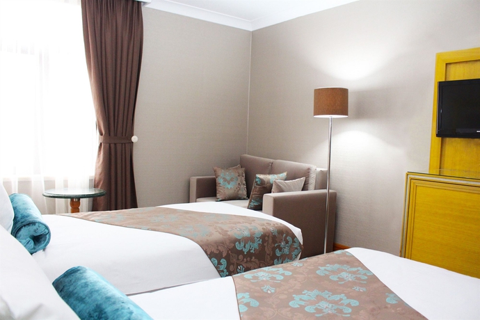 Imagen de la habitación del Hotel Villa Zurich. Foto 5