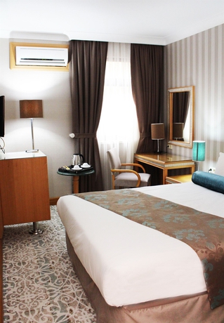 Imagen de la habitación del Hotel Villa Zurich. Foto 7