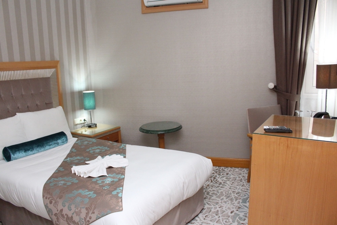 Imagen de la habitación del Hotel Villa Zurich. Foto 10