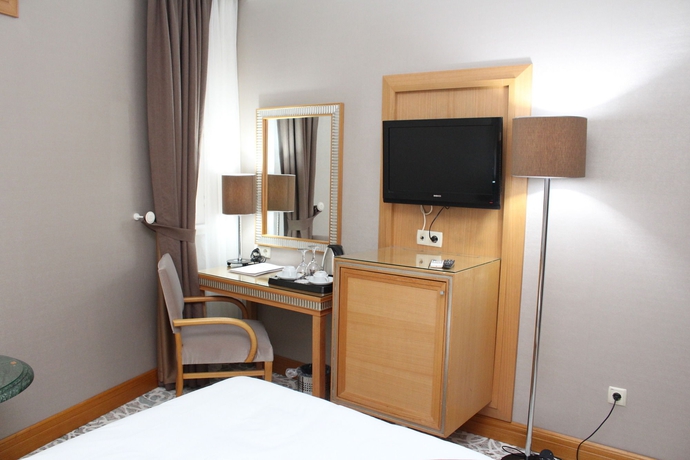 Imagen de la habitación del Hotel Villa Zurich. Foto 11