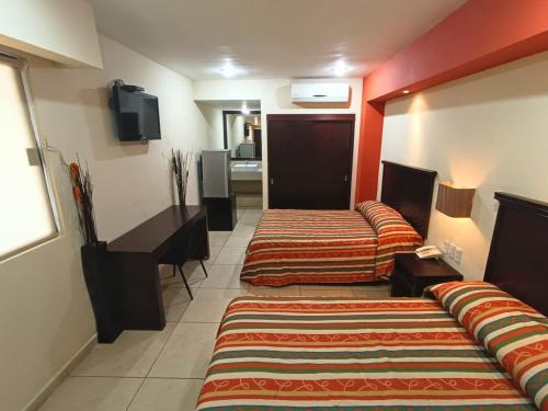 Imagen de la habitación del Hotel Villa de Altamira. Foto 19