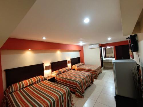 Imagen de la habitación del Hotel Villa de Altamira. Foto 20