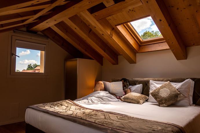 Imagen de la habitación del Hotel Villa del Poggio. Foto 14