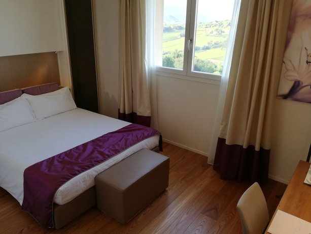 Imagen de la habitación del Hotel Villa del Poggio. Foto 17