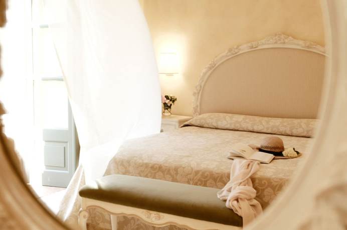 Imagen de la habitación del Hotel Villa di Campo. Foto 6