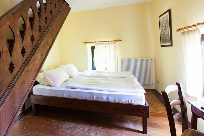 Imagen de la habitación del Hotel Villa di Tissano. Foto 17