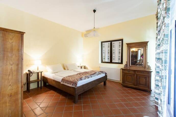 Imagen de la habitación del Hotel Villa di Tissano. Foto 18