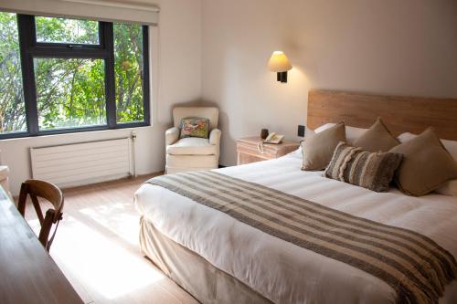 Imagen de la habitación del Hotel Villa el Descanso. Foto 17
