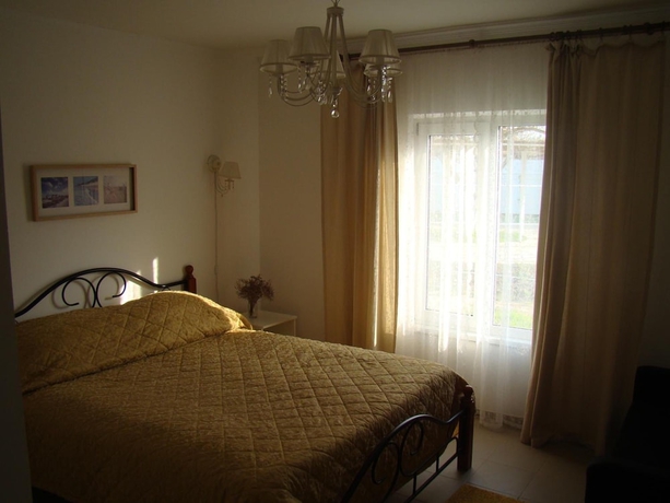 Imagen de la habitación del Hotel VillaPetra. Foto 9