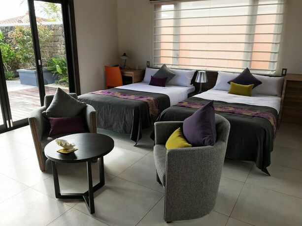 Imagen de la habitación del Hotel Villabu Resort. Foto 20