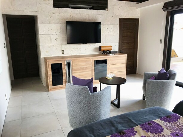 Imagen de la habitación del Hotel Villabu Resort. Foto 22