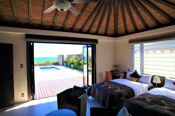Imagen de la habitación del Hotel Villabu Resort. Foto 23