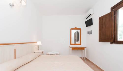 Imagen de la habitación del Hotel Village Baia Turchese. Foto 11
