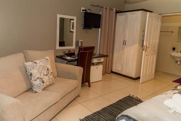Imagen de la habitación del Hotel Village Boutique, Otjiwarongo. Foto 13