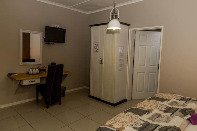 Imagen de la habitación del Hotel Village Boutique, Otjiwarongo. Foto 15