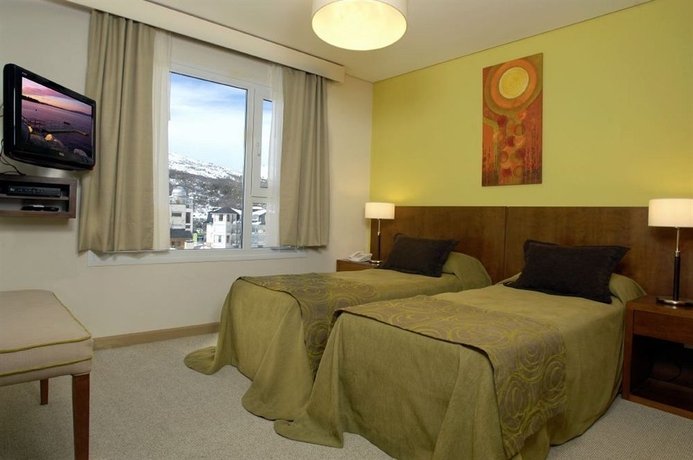 Imagen de la habitación del Hotel Village Condo. Foto 5
