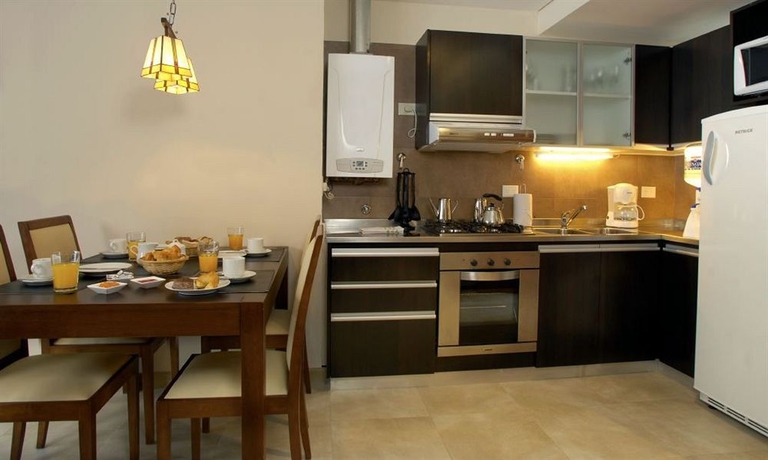 Imagen de la habitación del Hotel Village Condo. Foto 8