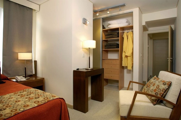 Imagen de la habitación del Hotel Village Condo. Foto 11