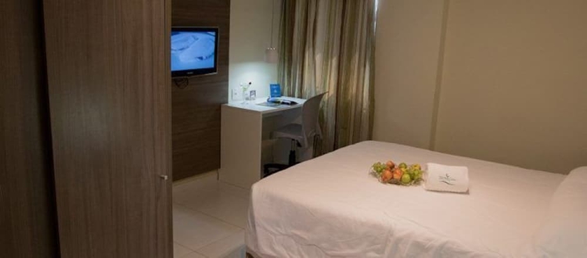 Imagen de la habitación del Hotel Village Confort. Foto 4