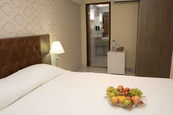 Imagen de la habitación del Hotel Village Confort. Foto 6
