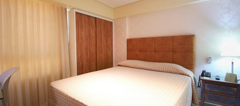 Imagen de la habitación del Hotel Village Confort. Foto 10