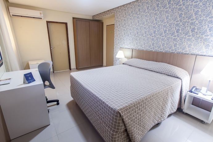 Imagen de la habitación del Hotel Village Confort. Foto 12