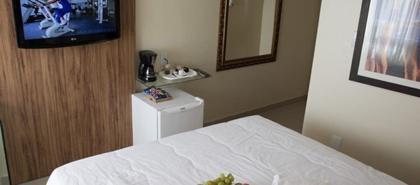 Imagen de la habitación del Hotel Village Confort. Foto 13