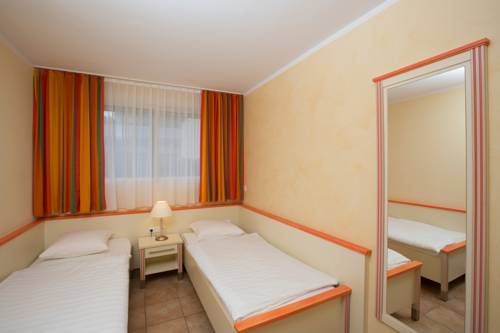 Imagen de la habitación del Hotel Village De Vacances Les Tourelles. Foto 5