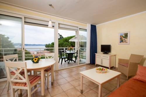 Imagen de la habitación del Hotel Village De Vacances Les Tourelles. Foto 16