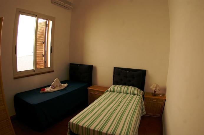 Imagen de la habitación del Hotel Village Eden. Foto 7