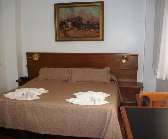 Imagen de la habitación del Hotel Village Garden Apart. Foto 7