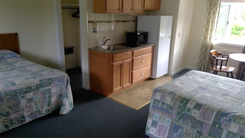 Imagen de la habitación del Hotel Village Green Motel. Foto 13