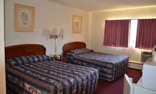 Imagen de la habitación del Hotel Village Inn. Foto 5