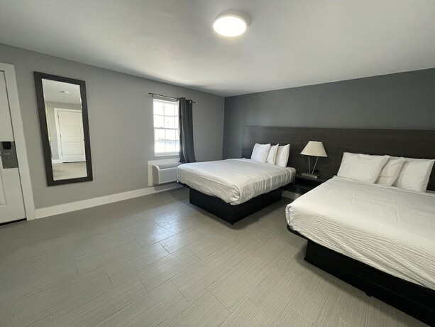 Imagen de la habitación del Hotel Village Inn Motel. Foto 19