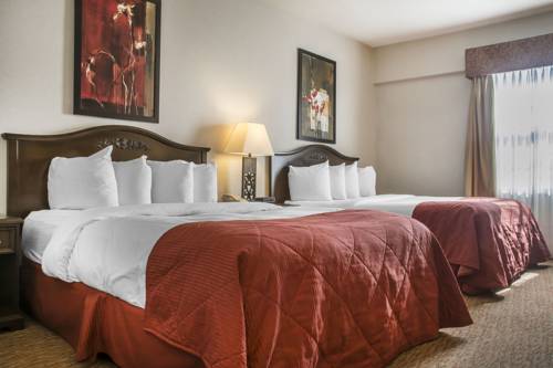 Imagen de la habitación del Hotel Village Inn & Suites. Foto 9