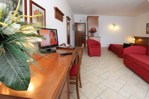 Imagen de la habitación del Hotel Village Lucia. Foto 4