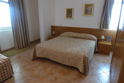 Imagen de la habitación del Hotel Village Lucia. Foto 6