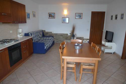 Imagen de la habitación del Hotel Village Lucia. Foto 10