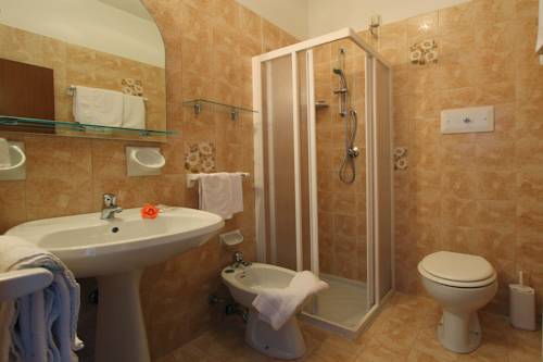 Imagen de la habitación del Hotel Village Lucia. Foto 13