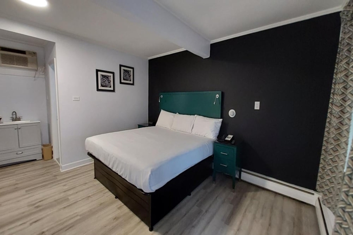 Imagen de la habitación del Hotel Village Motel By OYO Clinton. Foto 4