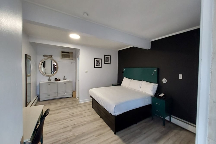 Imagen de la habitación del Hotel Village Motel By OYO Clinton. Foto 5