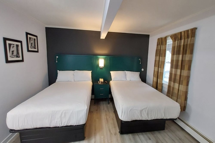 Imagen de la habitación del Hotel Village Motel By OYO Clinton. Foto 13