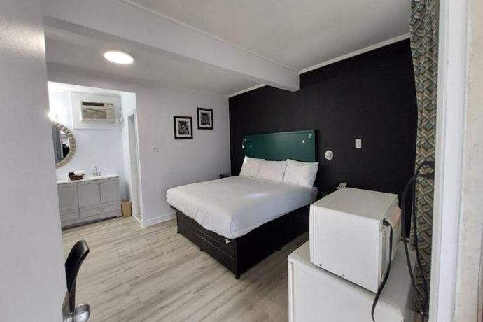 Imagen de la habitación del Hotel Village Motel By OYO Clinton. Foto 15