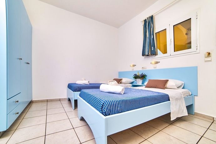 Imagen de la habitación del Hotel Village Oasis. Foto 3